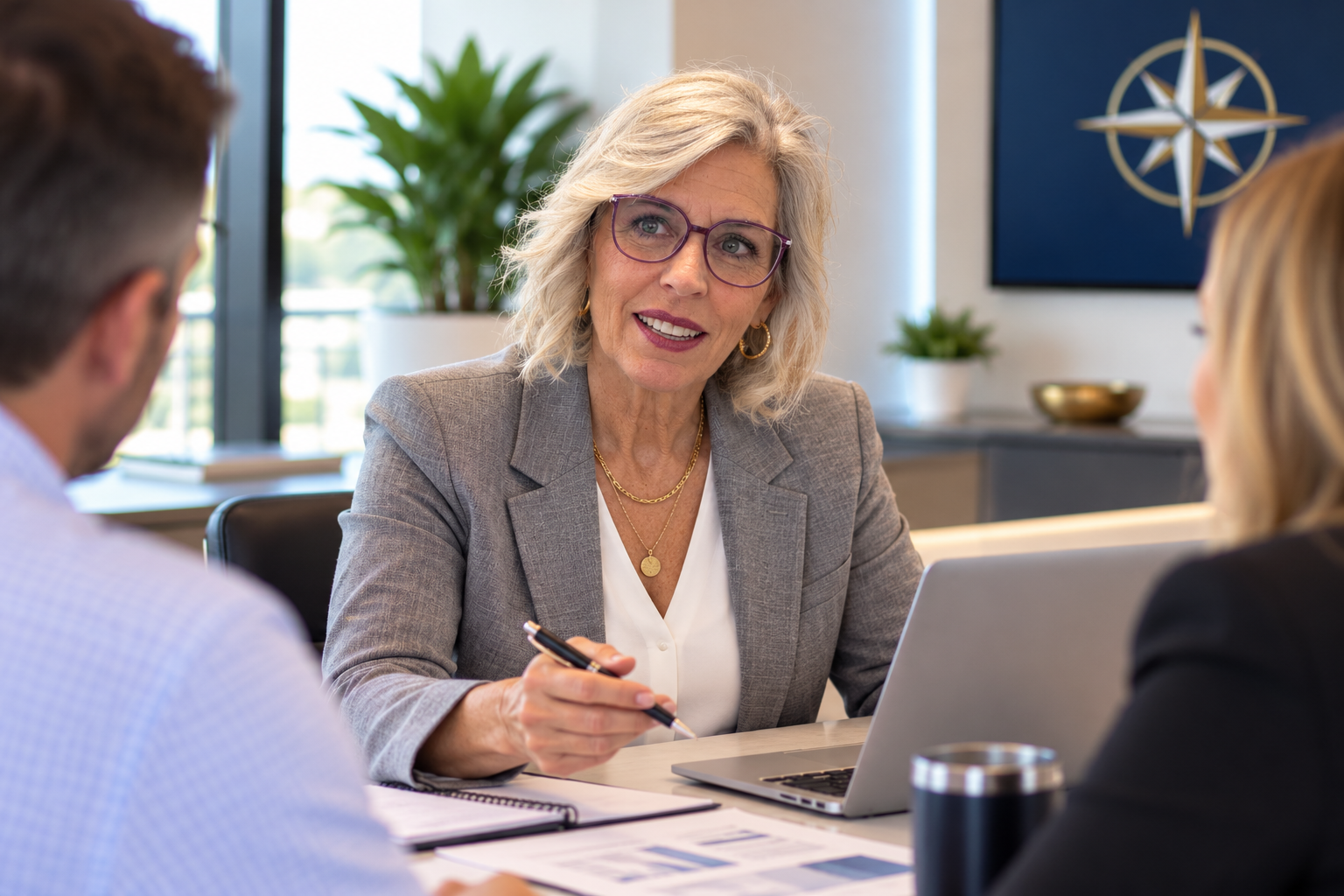 Carla Way collaborating with clients in a professional consultation meeting